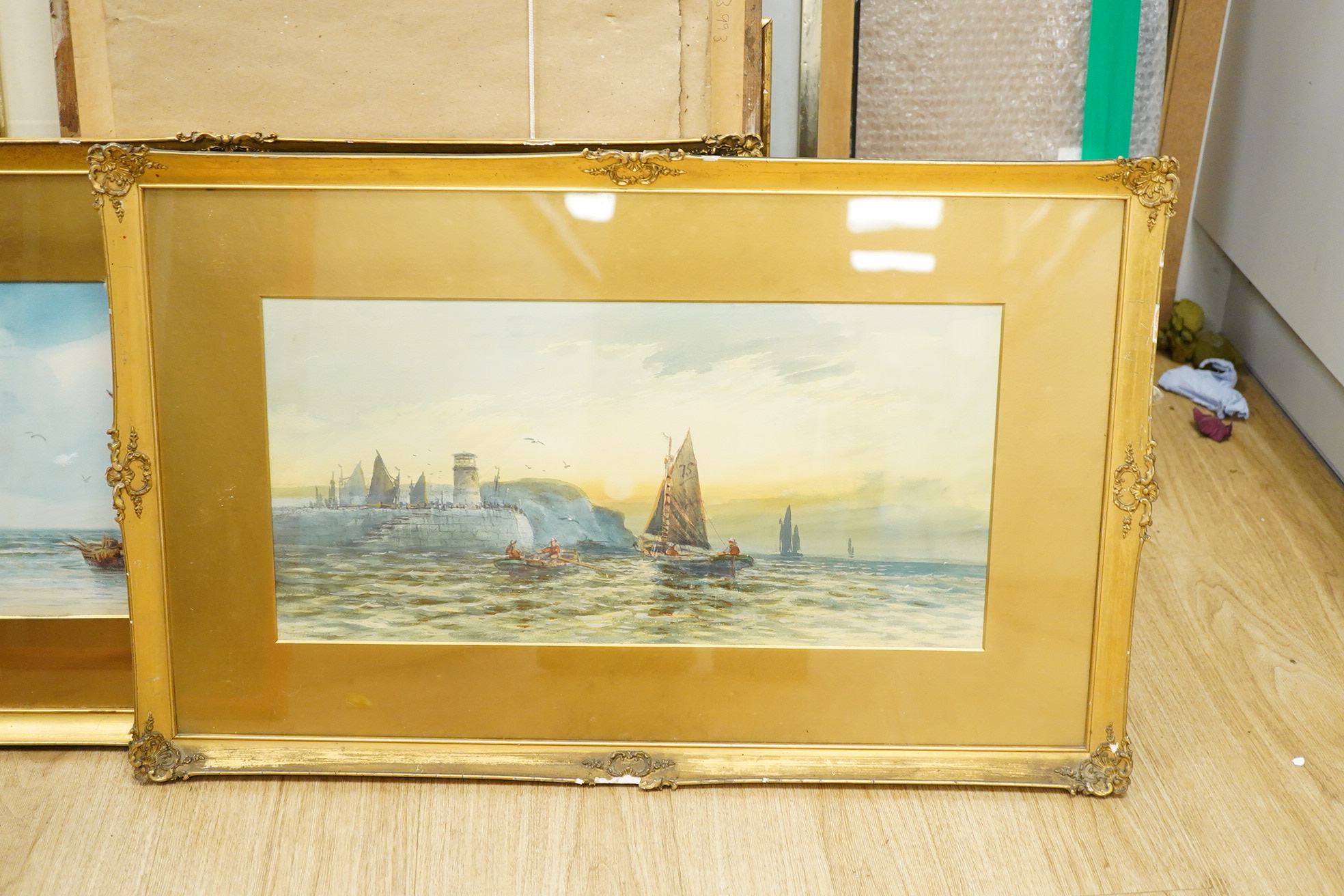 S. Watts, Fishing boats, one signed and dated 1912, pair of watercolours, gilt framed, 25 x 50cm